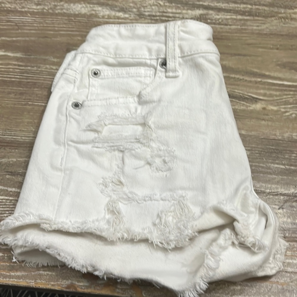 Girls size 00 super stretch American eagle white jean shorts